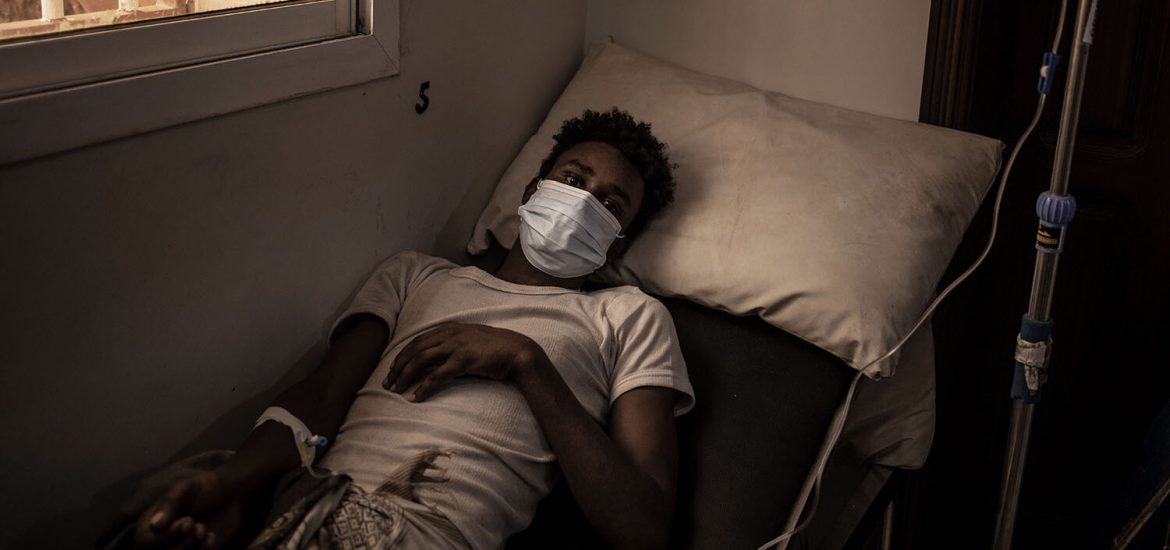 Ethiopian migrant is seen while receiving medical assistance within IOM’s MPR (a help center for migrants) in Aden, Yemen, September 5, 2021. (Manu Brabo)